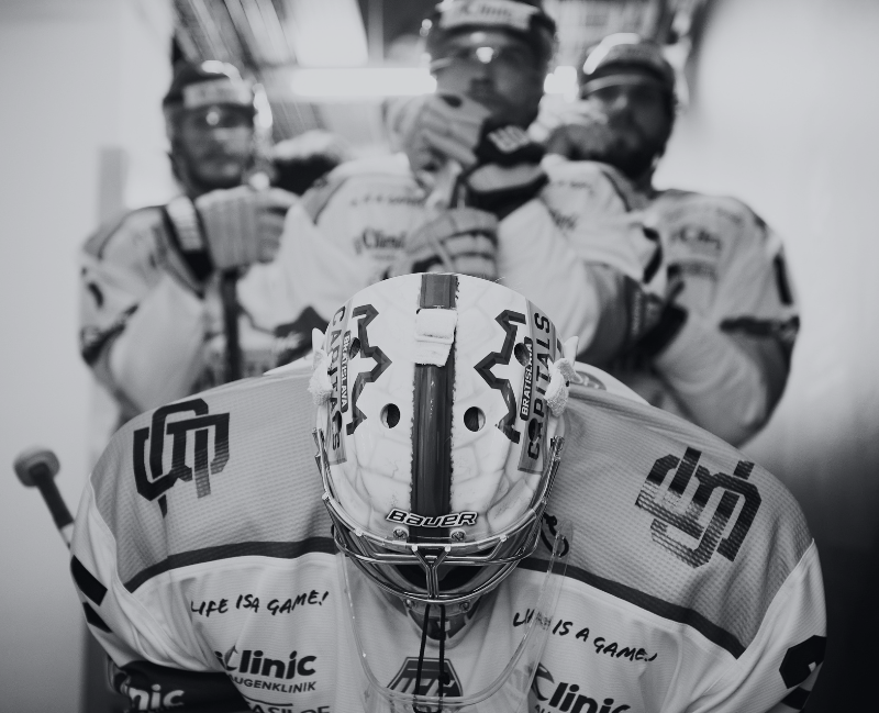 Hockey players getting ready for a game